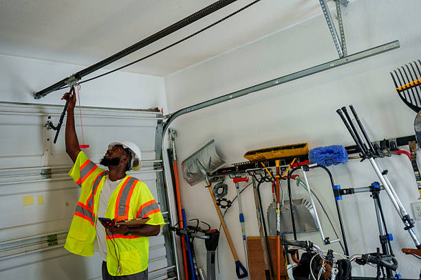 Professional Garage Door Panel Replacement technician working in Plains, MT